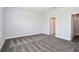 Spacious bedroom with neutral carpeting and trim, ready for personalization at 14552 Skipping Stone Loop, Parrish, FL 34219