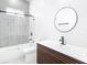 Modern bathroom featuring a shower, toilet, and floating vanity with vessel sink at 159 Antilla Dr, Rotonda West, FL 33947