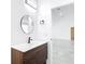 Modern bathroom with stylish vanity, modern fixtures, and ceramic tiles at 159 Antilla Dr, Rotonda West, FL 33947