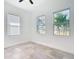 Well-lit bedroom with windows, views, and minimalist style at 159 Antilla Dr, Rotonda West, FL 33947