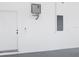 Clean garage interior showing water heater and electrical panel at 159 Antilla Dr, Rotonda West, FL 33947
