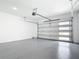 Spacious garage featuring modern garage door at 159 Antilla Dr, Rotonda West, FL 33947
