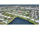 Stunning aerial shot of a community with multiple amenities and a tranquil lake at 6522 11Th W Ave, Bradenton, FL 34209