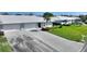 Attractive single-story home with a long driveway and well-manicured lawn, reflecting suburban comfort and convenience at 6522 11Th W Ave, Bradenton, FL 34209