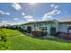 Attractive home featuring a well-kept lawn, tidy landscaping, and inviting entrance at 6522 11Th W Ave, Bradenton, FL 34209