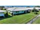 Aerial view of the property showcasing the beautiful landscaping and serene neighborhood at 6522 11Th W Ave, Bradenton, FL 34209