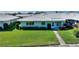 Charming home with a well-manicured lawn and inviting curb appeal at 6522 11Th W Ave, Bradenton, FL 34209