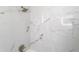 Luxurious shower featuring elegant white and gray marble tiling at 1724 Harbor Dr, Clearwater, FL 33755