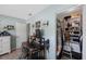 Bedroom featuring a desk, shelving unit, and a glimpse into a walk-in closet for plenty of storage at 5501 80Th N St # 201, St Petersburg, FL 33709