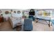 Open living room area with recessed lights, lots of natural light, and cozy seating at 5501 80Th N St # 201, St Petersburg, FL 33709