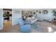 Open living room featuring recessed lighting, kitchen and dining area at 5501 80Th N St # 201, St Petersburg, FL 33709