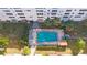 Overhead view featuring a serene pool area with lounge chairs surrounded by lush landscaping at 5501 80Th N St # 201, St Petersburg, FL 33709