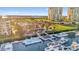 Stunning aerial view of waterfront resort with marina, pools, and restaurant at 606 Riviera Dunes Way # 207, Palmetto, FL 34221