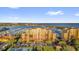 Stunning waterfront building with tennis courts, lush grounds, and marina access at 606 Riviera Dunes Way # 207, Palmetto, FL 34221