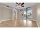Bright bedroom with private balcony overlooking the water and palm trees at 606 Riviera Dunes Way # 207, Palmetto, FL 34221