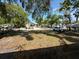 Lovely home featuring a well-maintained front yard and modern car at 1405 E Jean St, Tampa, FL 33604