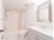 Bathroom with tub/shower combo, toilet, and vanity with sink at 2210 Utopian E Dr # 314, Clearwater, FL 33763