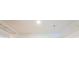 Walk in closet with shelving at 2210 Utopian E Dr # 314, Clearwater, FL 33763
