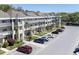 Condominium exterior featuring well-maintained balconies and parking at 2210 Utopian E Dr # 314, Clearwater, FL 33763