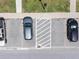 Overhead view of condo parking lot showing parking spots and drainage at 2210 Utopian E Dr # 314, Clearwater, FL 33763
