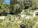 Aerial view of recreation area with walking paths and exercise equipment at 2210 Utopian E Dr # 314, Clearwater, FL 33763