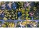 Bird's eye view of house, highlighting the pool, landscaping and neighborhood with property lines at 2503 Dumont Ln, North Port, FL 34286