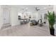Spacious living room with modern decor, featuring an open layout, light floors, and plenty of natural light at 2503 Dumont Ln, North Port, FL 34286