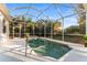 This home features a clean pool with screened enclosure, a patio, and nice landscaping at 2503 Dumont Ln, North Port, FL 34286