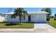 Charming single-story home featuring a well-manicured lawn and a private garage, perfect for comfortable living at 3708 97Th N Ave # 3, Pinellas Park, FL 33782