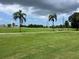 Picturesque golf course featuring green fairways, palm trees, and scenic views at 3708 97Th N Ave # 3, Pinellas Park, FL 33782