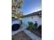 Exterior shot of home featuring attached garage and well-kept lawn at 355 Highland Shores Dr, Ellenton, FL 34222