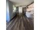 Modern kitchen featuring stainless steel appliances, a large island, and sleek countertops at 355 Highland Shores Dr, Ellenton, FL 34222