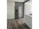 Kitchen features gray cabinets and a stainless steel refrigerator at 355 Highland Shores Dr, Ellenton, FL 34222