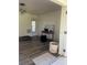 Living room with hardwood floors and modern ceiling light at 355 Highland Shores Dr, Ellenton, FL 34222