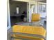 Relaxing patio area with cozy seating, plants, and a view of the backyard at 355 Highland Shores Dr, Ellenton, FL 34222