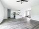 Expansive living area showcases a modern kitchen, sleek floors, and ample space for entertaining at 23113 Brewer Ave, Punta Gorda, FL 33980