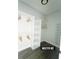 Walk-in closet featuring custom shelving for organizing clothes and accessories at 23113 Brewer Ave, Punta Gorda, FL 33980