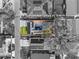 Overhead aerial view of property with solar panels, driveway, and surrounding neighborhood at 2912 W Frierson W Ave, Tampa, FL 33614
