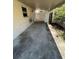 Covered patio with concrete flooring and a view of the backyard, perfect for outdoor living and entertaining at 1912 W Clinton St, Tampa, FL 33604
