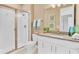Contemporary bathroom featuring a glass shower, granite countertop, and modern vanity at 9143 Players Dr, Weeki Wachee, FL 34613