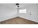 Bright bedroom featuring wood floors, a ceiling fan and natural light at 2353 Shelley St # 18, Clearwater, FL 33765
