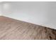 Neutral living space showcasing hard surface floors and freshly painted white walls at 2353 Shelley St # 18, Clearwater, FL 33765
