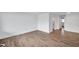 Neutral living space showcasing hard surface floors and freshly painted white walls at 2353 Shelley St # 18, Clearwater, FL 33765