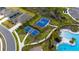 Aerial view of community featuring tennis and basketball courts, and a pool at 3884 Capri Coast Dr, Plant City, FL 33565