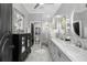 Modern bathroom with double vanity, walk-in shower, and stylish finishes at 1025 Royal Troon Ct, Tarpon Springs, FL 34688