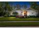 Charming home with well-maintained lawn and landscaping at 1025 Royal Troon Ct, Tarpon Springs, FL 34688