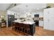 Spacious kitchen island with seating and modern appliances, in a open concept floor plan at 1025 Royal Troon Ct, Tarpon Springs, FL 34688