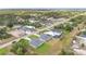 An elevated view shows the layout of neighborhood including roadways and surrounding properties at 488 Sunset N Rd, Rotonda West, FL 33947