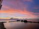 Colorful sunset over water, enhancing the appeal of this waterfront home at 6009 Sea Ranch Dr # 101, Hudson, FL 34667