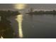 Calm waters reflect soft light, enhancing the beauty of the waterfront property at 6009 Sea Ranch Dr # 101, Hudson, FL 34667